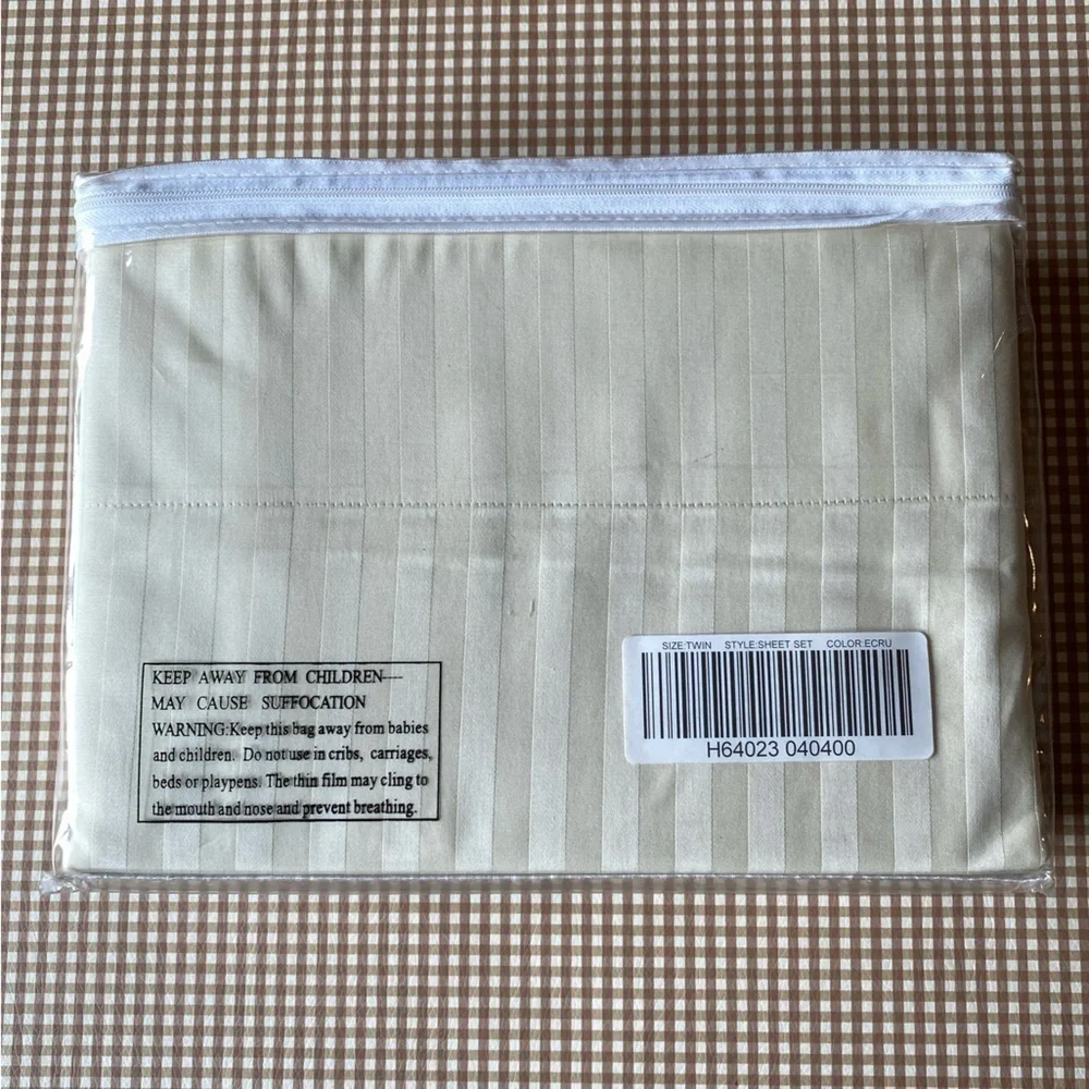 Northern Nights 100% cotton Ecru twin sheet set. NEW. Unopened